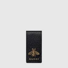 Shop online the latest ss21 collection of designer for men on ssense and find a necessity for some and a novelty for others, our latest variety of men's money clips caters to both sides of the spectrum as designer renditions. Men S Designer Luxury Money Clips Leather Money Clips Gucci Us