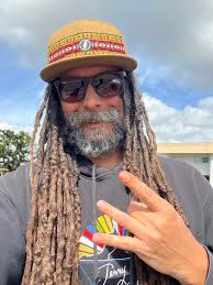 Handmade pageboy hats in purple and green