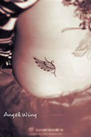 A Very Concise And Elegant Angel Wing Tattoo On The Hip Wing Tattoo Designs Beautiful Small Tattoos Tattoos