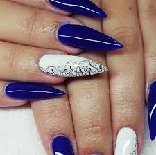 Another cute long acrylic nails can be achieved by painting your square coffin nails with a bright 17. Dark Blue And White Acrylic Nails Nail And Manicure Trends