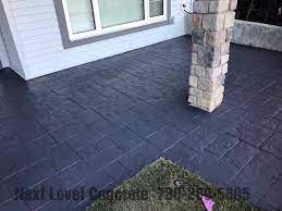 When projects are an overlay over existing materials, jobs go a lot quicker with less mess and upheaval. Flat Charcoal Grey Stamped Patio Next Level Concrete Ltd