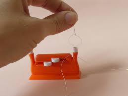 Draw the thread down around the threader guide and bring it from left to right in front of the needle. Great Tips And Tricks To Thread A Needle Madamsew