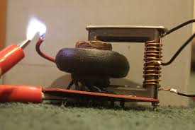 Since the motor is a 230/460, and you have a 208v supply, you would wire it low voltage. Flyback Transformer Wikipedia