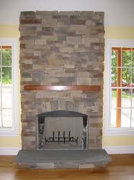 Stone corner fireplaces are very popular today. Stone Fire Places Stone Fireplace Pictures Stone Fireplace Designs Fireplace Design