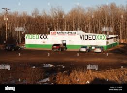 Porn shop in a rural location. Editorial use ONLY. Commercial use  prohibited. Licenses digitally obscured Stock Photo - Alamy