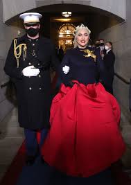 To give the outfit a final sleek appeal, lady gaga then buckled up a set of classic satin pumps. Behold Lady Gaga S Custom Schiaparelli Golden Inauguration Dove Fashionista