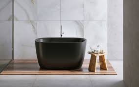 Taking a bath in a corner tub that has a skylight right above it. áˆ 10 Small Freestanding Bath Tub Small Soaking Tub Small Soaker Tub