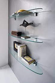 Shelves can never be enough to showcase one's accessories. Plana Is An 8mm Thick Oval Glass Shelf Suitable For Living Area Walls The Flat Side Is Mounted O Glass Shelves Decor Glass Wall Shelves Floating Glass Shelves