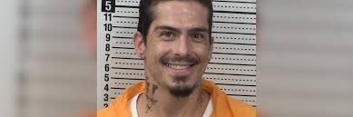 Man gets life for strangling mother, hiding body in bleach-cleaned shower