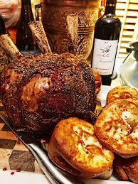 Pat the rib roast dry and liberally season with 1 tablespoon of salt and 1 tablespoon pepper. A Christmas Dinner Standing Beef Rib Roast Yorkshire Pudding In The Kitchen With Scotty
