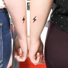 Consider having a single design split equally into two. Harry Potter Couples Tattoos Popsugar Love Sex