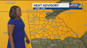 Storms prompt ground stop at Atlanta airport, warnings; heat advisory in effect for 4th of July