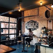 Goal Figure Out How To Incorporate These Cool Garage Doors Into My Life Photo Credit Ind Coffee Shops Interior Coffee Shop Interior Design Coffee Shop Decor