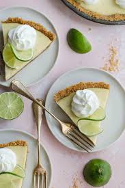 Individual Slices Of Key Lime Pie On Dessert Plates With Forks Authentic Key Lime Pie Keylime Pie Recipe Lime Pie