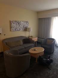 Shop eclectic sofas, chairs, tables and more online now. Living Room With Coffee Table Sofa And Side Chairs Picture Of Courtyard By Marriott Sandestin At Grand Boulevard Tripadvisor