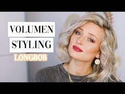 meta ein gestufter long bob gehort zu den aktuell angesagtesten frisuren welche stufen wurden dir s in 2021 longbob frisuren feines haar frisur volumen haarschonheit