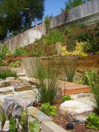 When in full bloom, this hillside burst with colors 10 Most Inspiring Retaining Wall Ideas For Steep Slopes In A Spacious Garden Aprylann