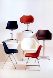 10 Iconic Chair Designs From The 1960s Iconic Chairs Robin Day Furniture Design