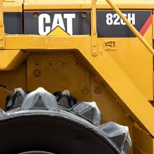Image result for Caterpillar New Yellow 1995 Fleet