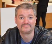 People shopping for sales, checking off Christmas lists