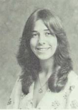 High school senior photo 1977. Now "65" 2024.