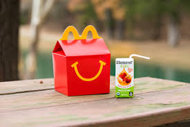 A happy meal contains a main item (typically a hamburger, cheeseburger, or small serving of chicken mcnuggets), a side item (french fries, apple slices, or a salad in some areas), and a drink (milk, juice, or a soft drink). Honest Tea On Twitter When You Re On The Go Give Them Honestkids Organic Apple Juice Drink Now Available In Mcdonalds Happy Meals