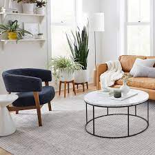Your coffee table is the center of your living room. Streamline Round Coffee Table