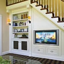 17 Clever Uses For The Space Under The Stairs Living Room Under Stairs Room Under Stairs Home