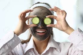 Vanishing cream is my new favourite thing!! Girl With Cosmetic Mask On Face Cucumbers In Eyes Clay And Coal Pull Pollution Out Pores Moisturizing And Soothing For Quick Recovery Ffectiveness Home Cosmetics Deep Removing Blackheads Stock Photo Picture And