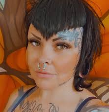 Who is a reasonable but skilled tattoo professional artist in the area?