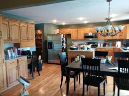 Sherwin Williams Retreat Grey Green Paint Wall Color With Honey Oak Kitchen Cabinets And Floor Kitchen Redecorating Kitchen Cabinets And Flooring Kitchen Redo