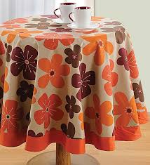 This plain cotton orange tablecloth's vivid colour will add a fun flair to your dining space and will look great regardless of whether your decor is traditional or contemporary. Buy Floral Pattern Orange Cotton 60x60 Inch Table Cloth By Swayam Online Table Cloths Table Cloths Furnishings Pepperfry Product Table Cloth Dining Table Cloth Holiday Table Decorations