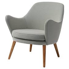 Featured in a white cushioned back and seat, maximum comfort is guaranteed. Warm Nordic Dwell Armchair Merit 021 Finnish Design Shop