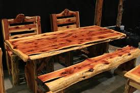 Our big woods log dining tables are perfect for homes, cabins and lodges because of their rustic good looks, quality and flexibility in sizes. Cedar Log Dining Tables By Cedar Bluff Furniture