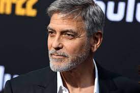 Here, clooney's scruff accentuates the casual nature of his hair, which is left just slightly longer than a caesar. George Clooney Uses A Flowbee To Cut His Own Hair