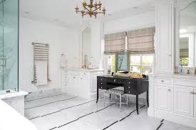 Black And White Marble Floor Tiles White Marble Floor Tiles Display A Staggered Black Trim That Adds Dimension To An All White And Marb White Master Bathroom Master Bathroom White Modern Kitchen