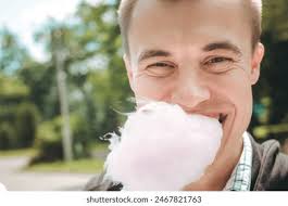 1+ Thousand Man Eating Cotton Candy Royalty-Free Images, Stock Photos &  Pictures