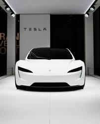 Wonder no more as we have discovered a couple of guys wrapping their beauties with the darkness, looks stunning on the car. Black Tesla Roadster Wallpaper
