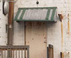 A Complete Step By Step Guide Explaining How To Clean Paint And Seal A Rusted Metal Awning Aluminum Awnings Painting Metal Doors Metal Awning