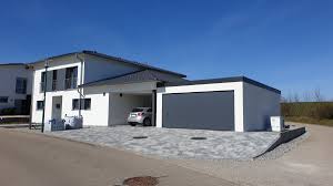 The cost of adding a single or double car garage. Doppel Garage Grossraumgarage Aus Stahl Mit Sektionaltor News Brandl