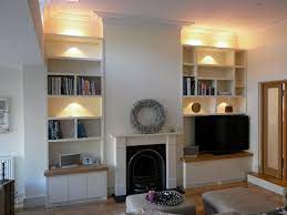 bespoke alcove shelves cupboards each side of a traditional fireplace at beautiful victorian ideas living room storage lego