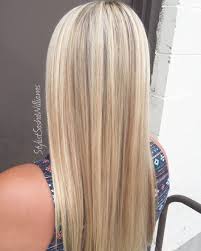 I think her natural hair is a dark brown, which you can tell by her eyebrows. The Perfect Natural Blonde Foil Highlights And Toned Natural Blonde Hair With Highlights Blonde Foils Dimensional Hair Color