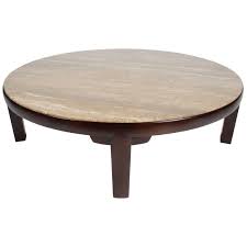 When you are entertaining in the living room, you can easily put decorative central items functional a round. Large Edward Wormley For Dunbar Round Coffee Table With Walnut Roman Travertine For Sale At 1stdibs