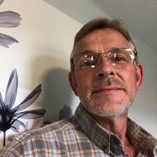 What is causing the leak in the back passenger side corner of my 2012 Dodge  RAM 1500 cab and how can I fix it?