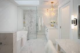 Pictures of porcelain marble bathrooms. Brass Crystal Droplets Chandelier Over His And Her Sinks Transitional Bathroom
