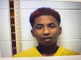 Report of shots fired at local bank leads to two arrests