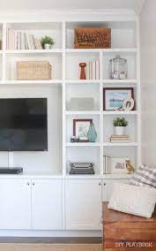 How We Re Learning To Live With Less The Diy Playbook Living Room Design Decor Family Room Living Room Built Ins