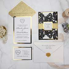 These gold wedding invitations are not only easy to use but at the same time are also easy on your pocket. Luxury Black Shimmer Laser Cut Wedding Invitations With Gold Glittery Mirror Paper Pwil064 Pro Wedding Invites