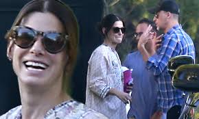 Sandra Bullock and Bryan Randall attend pool party