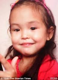 Russian 'Mowgli girl' is discharged from hospital: Toddler, three, who  survived 12 days and nights in remote forest with only dog for company gets  clean bill of health